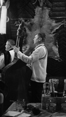 Cello Player in Romanian Restaurant 