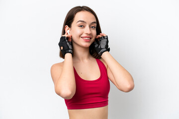 Young Ukrainian woman isolated on white background listening music