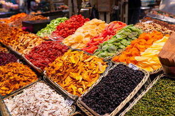 Dried fruits at a street market. Pineapple, Melon, Mango, coconut, apricot and Apple Delight. Copy...