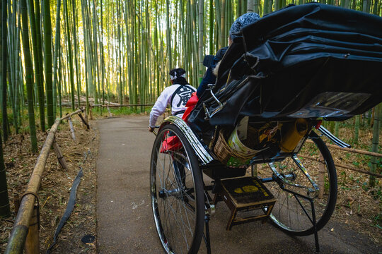 Kyoto, Japan - Jan 08, 2024: Japanese rickshaw in Arashiyama Bamboo Forest at Kyoto, Japan