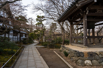 Fototapeta premium Kyoto, Japan - Jan 08, 2024: Jojakko-ji Temple, a Buddhist temple in a serene forest at Sagaogurayama Oguracho, Ukyo Ward, Kyoto, Japan.