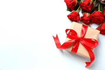 Beautiful gift with a bouquet of red roses