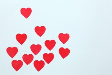 Red hearts on a colored background
