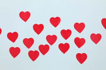 Red hearts on a colored background
