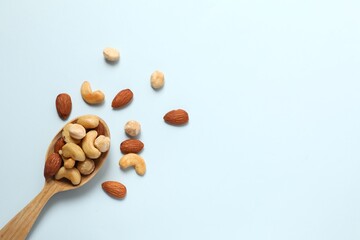 Mixed nuts on colored background
