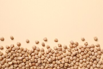Raw chickpeas on colored background. Healthy and natural vegetarian food