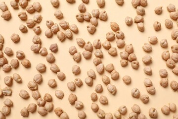 Raw chickpeas on colored background. Healthy and natural vegetarian food