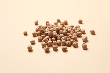 Raw chickpeas on colored background. Healthy and natural vegetarian food