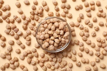 Raw chickpeas on colored background. Healthy and natural vegetarian food