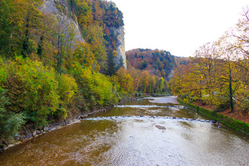 Scenic autumn view of the Aare river in Switzerland