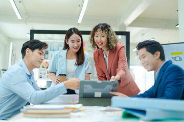Group of young asian creative business brain storm meeting presentation,discussing roadmap to product launch, planning,strategy,new business development,working with new startup project in office.