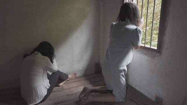Two women's of victim in the room, Human trafficking