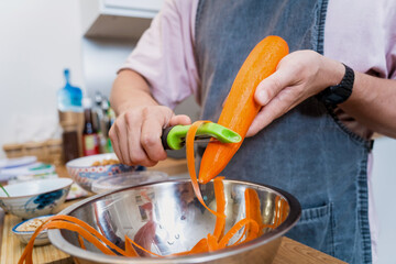 Chef at the kitchen preparing massaman curry with sweet potato and many spices