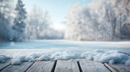 Snowy background empty wooden plank covered in light snow winter-themed display or holiday...