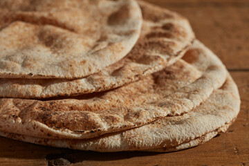 a stack of whole wheat pita breads
