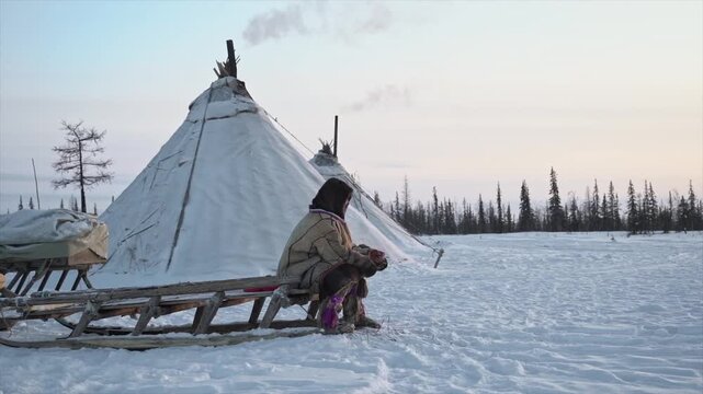 Yamal reindeer herder in clothes made of skins
