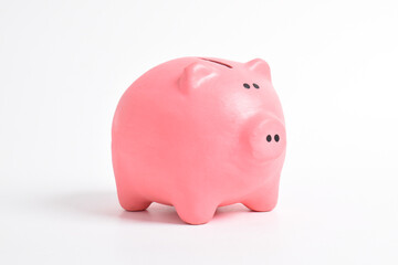 Pink piggy bank isolated on white background. Cash savings. Finance and Investment concept