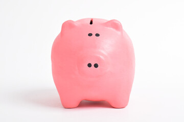 Pink piggy bank isolated on white background. Cash savings. Finance and Investment concept