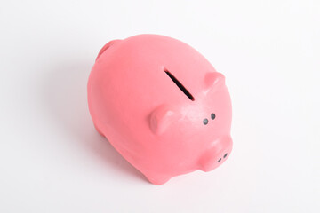 Pink piggy bank isolated on white background. Cash savings. Finance and Investment concept