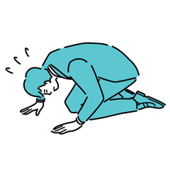 土下座しているスーツ姿の男性

