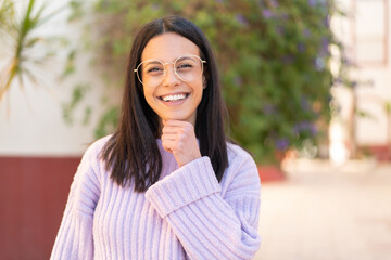 Young woman at outdoors With happy expression