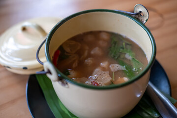Tom yum, Thai Seafood spicy soup in Thai style bowl.