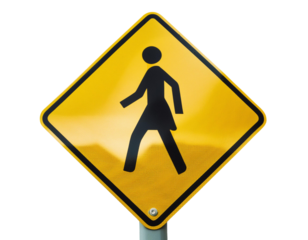 Yellow pedestrian crossing sign with black walking figure on isolated white background, road safety symbol for traffic and walking paths.