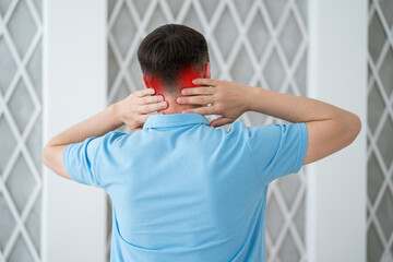 Neck pain, cervical spine hernia, man suffering from ache at home