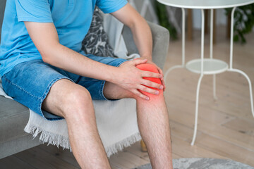 Knee pain, joint inflammation, arthritis and degenerative changes, man suffering from leg ache and...