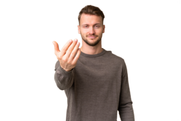 Young handsome caucasian man over isolated chroma key background inviting to come with hand. Happy that you came
