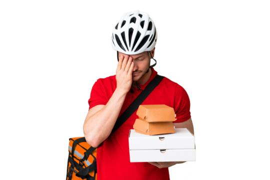 Young delivery man taking a takeaway food over isolated chroma key background with tired and sick expression