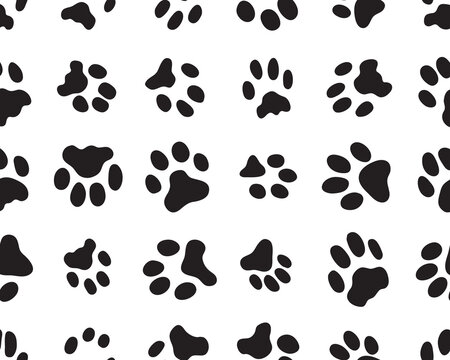Seamless pattern of black silhouettes of prints of cat paw