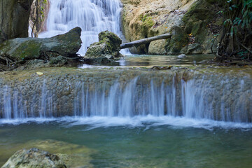 Obraz premium &nbsp;Scenic view of waterfall in forest