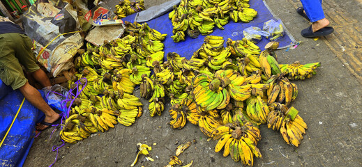 Banana selling at the wet market in Bogor city, west Java in Asia street market fruit vendor,...