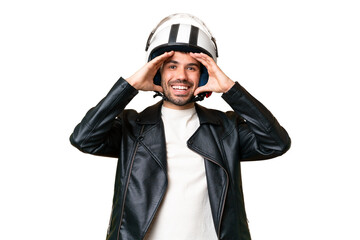Young caucasian man with a motorcycle helmet over isolated chroma key background with surprise expression
