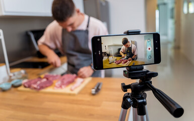 The chef is broadcasting live from workshop how to prepare a beef steaks on the electric grill