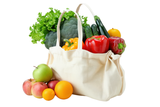 Reusable grocery bag containing fresh fruits and vegetables isolated on white background.