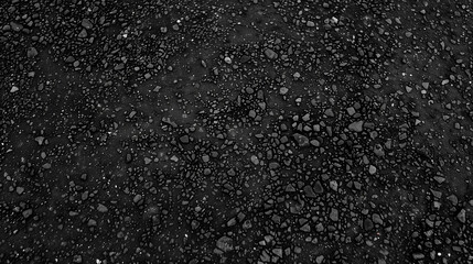 A black and white photo of a rocky surface