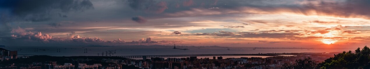 sunset afterglow over the shenzhong bridge