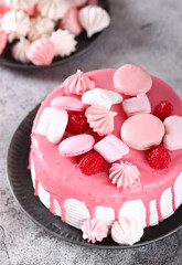 pink cake dessert with fresh berries