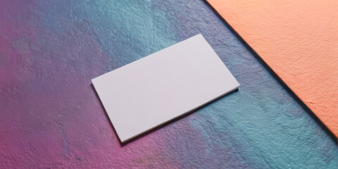 business card on a textured multicolored background