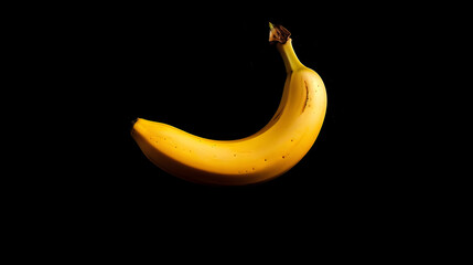 Ripe yellow banana, vibrant against the stark black backdrop, in a modern and stylish design.