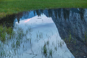 Mirror Lake full after snow melt in the spring, El Capitan reflections, in the Yosemite National Park, Sierra Nevada mountain range in California, USA. El Capitan from Cooks Meadow.