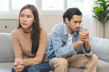 Breakup and depressed, asian young quarrel couple love fight relationship in trouble. Different people are emotion angry. Argue wife has expression upset with husband. Problem of family people.