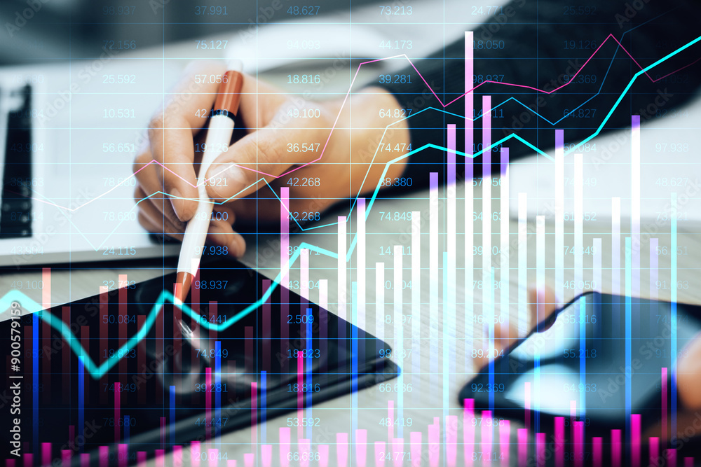 Poster Analyzing Financial Data on Tablet with Overlayed Graphs and Charts.