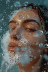 Fototapeta premium A close-up shot of a woman's face with bubbles forming and popping around her mouth