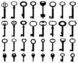 Set of black silhouettes of door keys on a white background