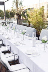 Beautiful table set for an event party or wedding reception . restaurant interior