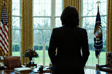 Silhouette of a female President of the United States of America standing by her desk in the Oval Office of the White House, contemplating a historic presidential decision. Woman elected US President.