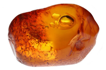 rare water inclusion in amber from Bitterfeld, Germany isolated on white background